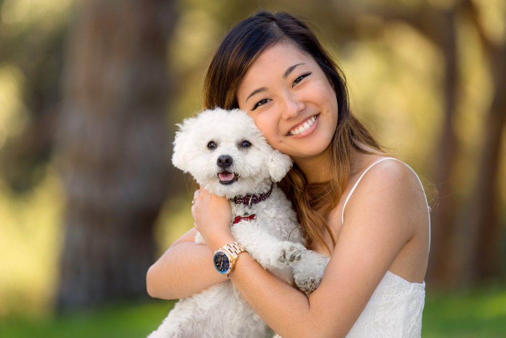 Little dog with owner