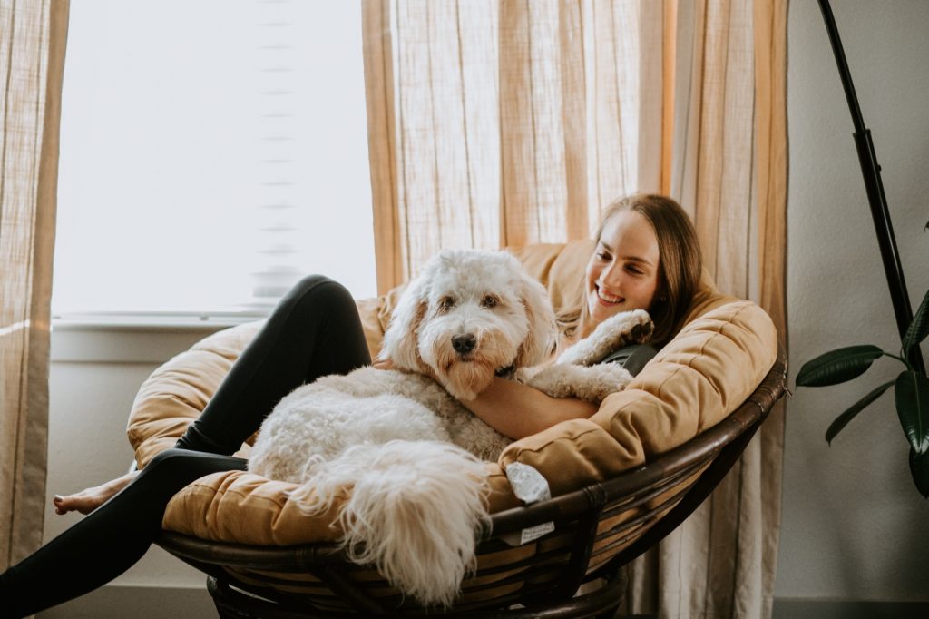 Woman and her dog at home